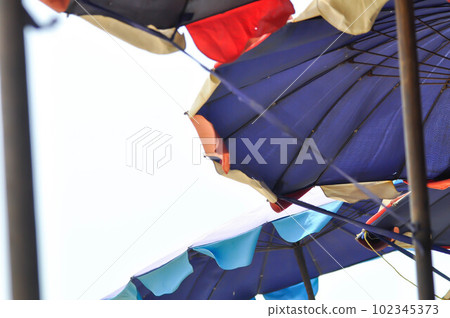 parasol, umbrella or beach umbrella and sky parasol, umbrella or beach umbrella and sky 102345373