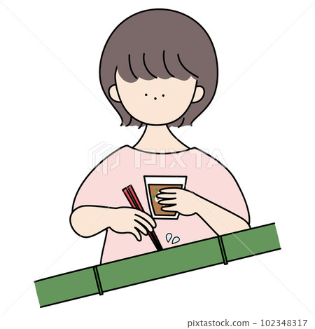 A girl playing somen nagashi 102348317