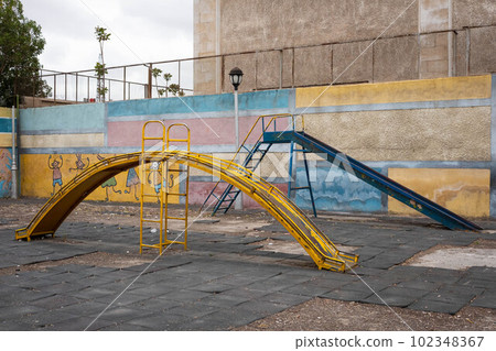 run down slide on old playground, Damascus, Syria run down slide on old playground, Damascus, Syria 102348367