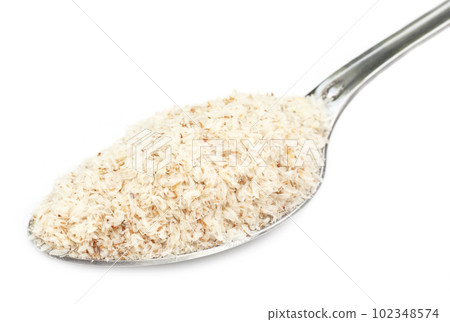 Medicinal herbs isabgul on a spoon Medicinal herbs isabgul on a spoon 102348574