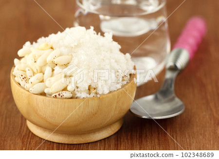 Puffed rice with coconut 102348689