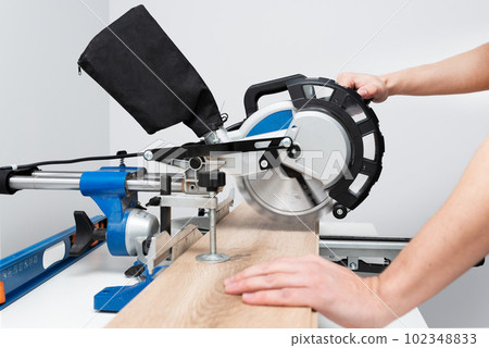Board and miter saw, floor panel cut 102348833