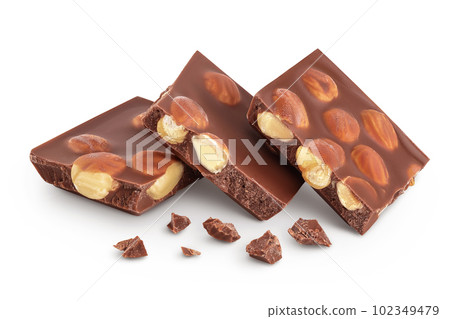 Chocolate with hazelnuts isolated on white background with full depth of field. Chocolate with hazelnuts isolated on white background with full depth of field. 102349479