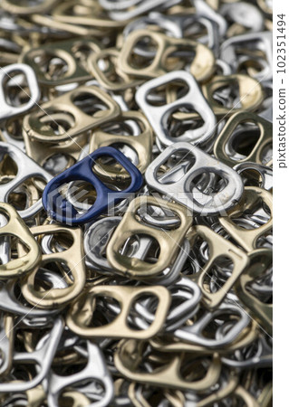 A lot of silver aluminum can pull tabs A lot of silver aluminum can pull tabs 102351494