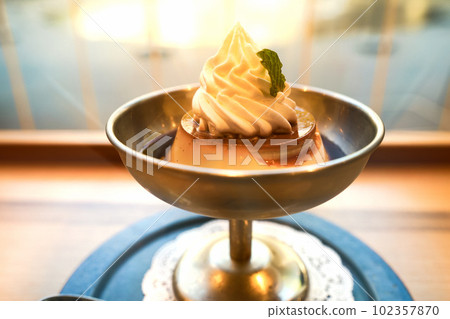 Pudding fresh cream in a stainless steel container 01 Pudding fresh cream in a stainless steel container 01 102357870