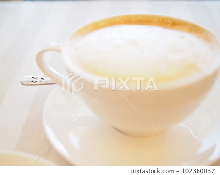 Cafe au lait at the cafe Cafe au lait at the cafe 102360037