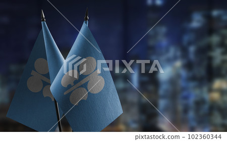 Small flags of the Organization of the Petroleum Exporting Countries on an abstract blurry background Small flags of the Organization of the Petroleum Exporting Countries on an abstract blurry background 102360344