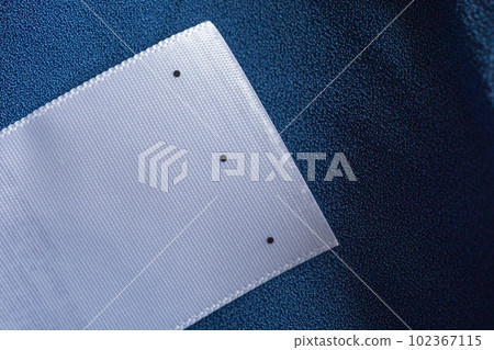 laundry care clothing label on blue dress laundry care clothing label on blue dress 102367115