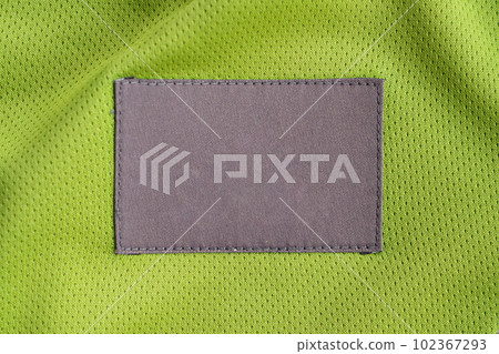 laundry care clothing label patch on polyester fabric jersey sport texture laundry care clothing label patch on polyester fabric jersey sport texture 102367293