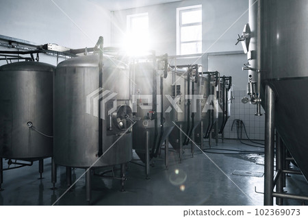 beer production plant. interior of modern technological brewery beer production plant. interior of modern technological brewery 102369073