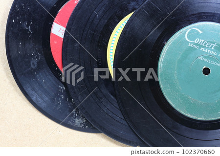 Old records stained with mold and scratches Old records stained with mold and scratches 102370660