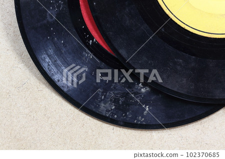Old records stained with mold and scratches 102370685