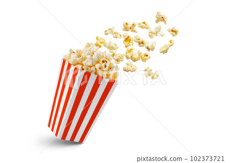 Popcorn flying out of red white striped paper box, isolated on white background 102373721