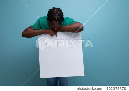 male promoter holding a billboard with mockup 102373878