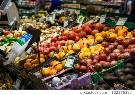 Swiss supermarket vegetable counter 102376353