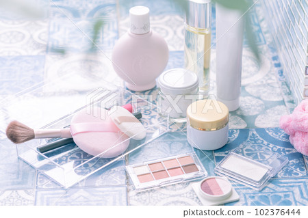 Makeup tools lined up on tiles Makeup tools lined up on tiles 102376444