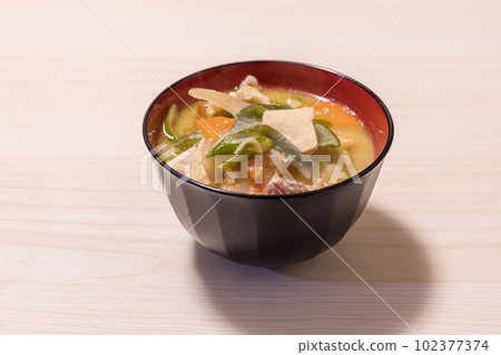 Miso soup with pork and vegetables Miso soup with pork and vegetables 102377374
