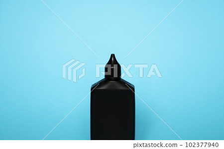 Mock up unbranded black bottle of finish line dry bicycle lubricant. Bicycle care, bicycle chain care. Mock up unbranded black bottle of finish line dry bicycle lubricant. Bicycle care, bicycle chain care. 102377940