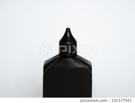 Mock up unbranded black bottle of finish line dry bicycle lubricant. Bicycle care, bicycle chain care. Mock up unbranded black bottle of finish line dry bicycle lubricant. Bicycle care, bicycle chain care. 102377941