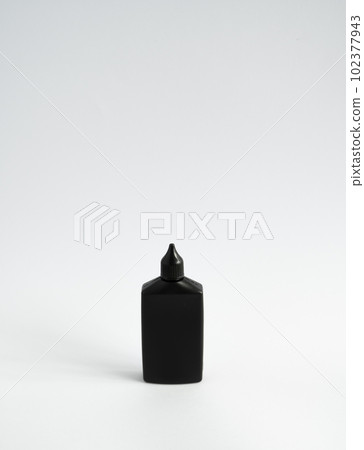 Mock up unbranded black bottle of finish line dry bicycle lubricant. Bicycle care, bicycle chain care. 102377943