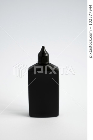 Mock up unbranded black bottle of finish line dry bicycle lubricant. Bicycle care, bicycle chain care. Mock up unbranded black bottle of finish line dry bicycle lubricant. Bicycle care, bicycle chain care. 102377944
