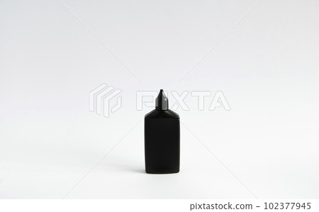 Mock up unbranded black bottle of finish line dry bicycle lubricant. Bicycle care, bicycle chain care. Mock up unbranded black bottle of finish line dry bicycle lubricant. Bicycle care, bicycle chain care. 102377945