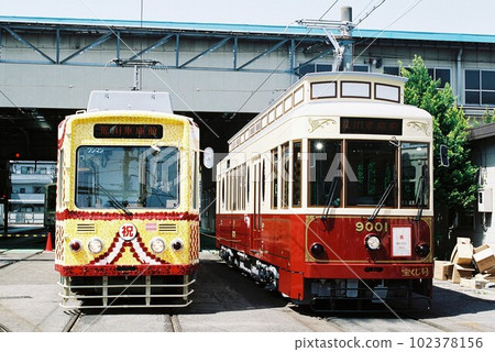Toden-Arakawa Line 7000 and 9000 lined up at the depot Toden-Arakawa Line 7000 and 9000 lined up at the depot 102378156