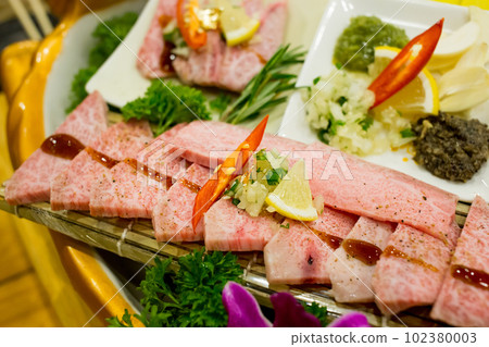 Top view of Set of striped calf beef prepare for grilled, focus selective Top view of Set of striped calf beef prepare for grilled, focus selective 102380003