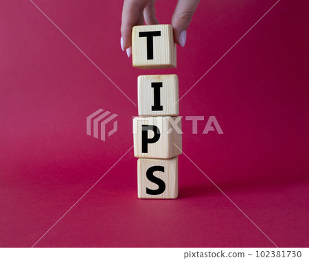 Stop symbol. Concept word Stop on wooden cubes. Businessman hand. Beautiful red background. Business and Stop concept. Copy space. Stop symbol. Concept word Stop on wooden cubes. Businessman hand. Beautiful red background. Business and Stop concept. Copy space. 102381730