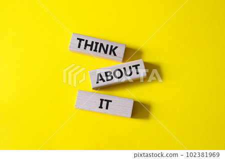 Think about it symbol. Wooden blocks with words Think about it. Beautiful yellow background. Business and Think about it concept. Copy space. 102381969