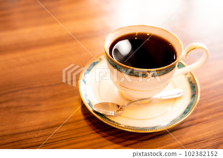 hot coffee in coffee cup hot coffee in coffee cup 102382152