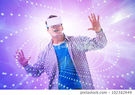 Metaverse concept with man and virtual reality glasses Metaverse concept with man and virtual reality glasses 102382649