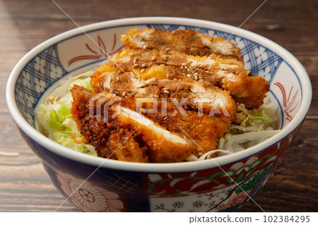 Sauce cutlet rice bowl with chicken fillet 102384295