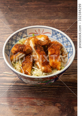 Sauce cutlet rice bowl with chicken fillet Sauce cutlet rice bowl with chicken fillet 102384299