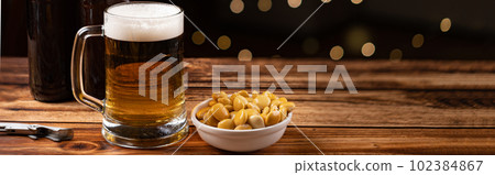 salted Lupin Beans with beer on table with copy space salted Lupin Beans with beer on table with copy space 102384867