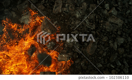 Burning coal with fire, top view shot. 102386110