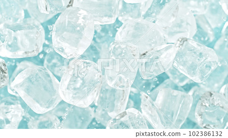 Freeze motion of flying ice cubes isolated on blue background. Freeze motion of flying ice cubes isolated on blue background. 102386132