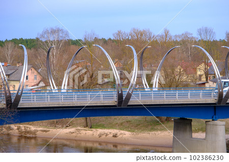 Valmiera, Latvia - April 14 2023: Valmiera city center. Bridge across the river. 102386230