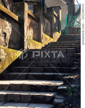 footsteps in the old city. travel background footsteps in the old city. travel background 102386541