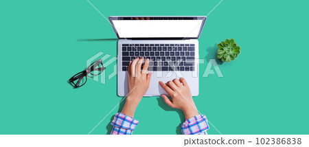 Person using a laptop computer 102386838