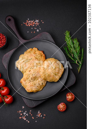 Delicious fried chopped fillet pancakes with spices, salt and herbs Delicious fried chopped fillet pancakes with spices, salt and herbs 102387136
