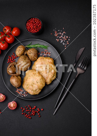 Delicious fried chopped fillet pancakes with spices, salt and herbs 102387175