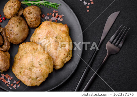 Delicious fried chopped fillet pancakes with spices, salt and herbs 102387176