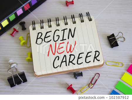 Begin new career symbol. Concept word Begin new career on white notebook. Beautiful wooden background. Business and Begin new career concept. Copy space 102387912