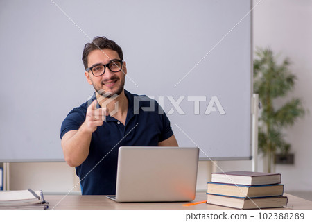 Young male teacher in telestudying concept Young male teacher in telestudying concept 102388289