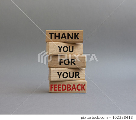 Feedback symbol. Wooden blocks with words Thank you for your Feedback. Beautiful grey background. Business and Thank you for your Feedback concept. Copy space. 102388418