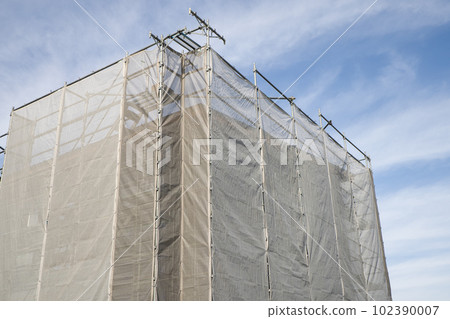 Residential image Scaffolding during housing construction Architectural curing sheet 102390007
