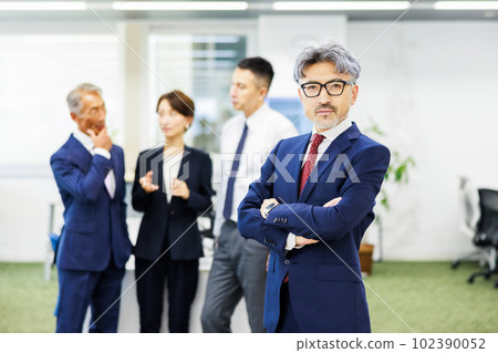 A businessman standing in the office 102390052