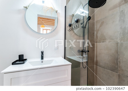 Modern shower cabin and washbasin for indoor hygiene. Toilet in apartment. 102390647