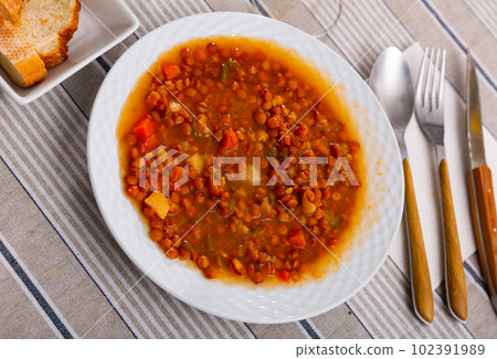 Homemade vegan lentil soup with vegetables 102391989
